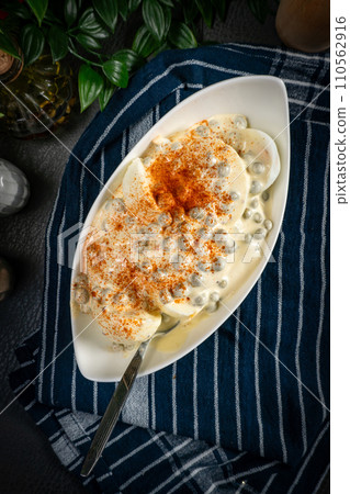 Boiled halvese egg with mayonnaise. Boiled halvese egg with mayonnaise. 110562916