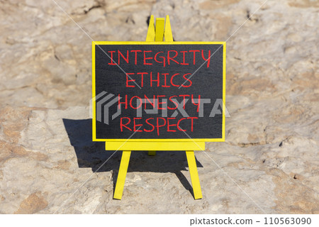 Integrity ethics honesty respect symbol. Concept word Integrity Ethics Honesty Respect on beautiful blackboard. Beautiful red stone background. Business integrity ethics honesty respect concept. 110563090