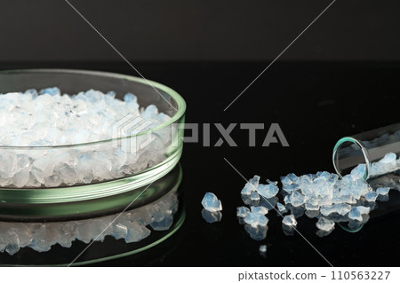 Pure silica gel crystals on black background Pure silica gel crystals on black background 110563227