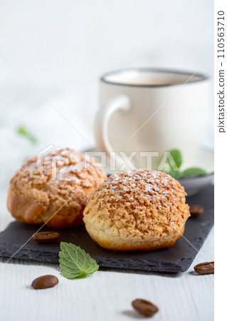 Homemade choux with coffee cream. Homemade choux with coffee cream. 110563710