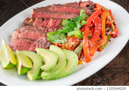 Sizzling Steak Fajitas 110564020