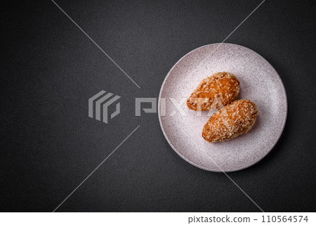 Delicious fresh cutlet or meatball Kiev style with filling 110564574