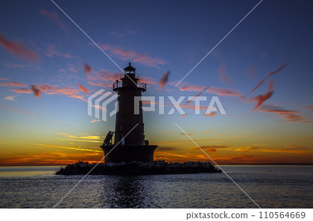 West bank lighthouse at sunrise 110564669