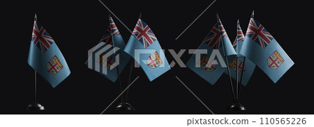 Small national flags of the Fiji on a black background 110565226