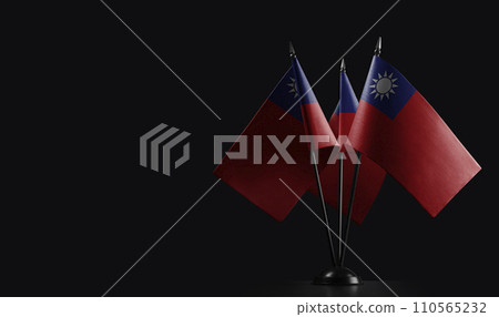 Small national flags of the Taiwan on a black background 110565232