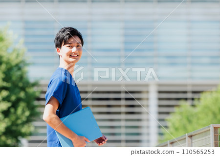 Medical image young male nurse 110565253