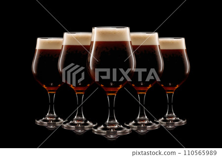 Set of Beer glasses on a black background. Mugs with drink like Ipa, Pale Ale, Pilsner, Porter or Stout Set of Beer glasses on a black background. Mugs with drink like Ipa, Pale Ale, Pilsner, Porter or Stout 110565989