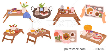 Set of Charming Bed Tables, Adorned With Tablecloths, Hold A Delightful Breakfast, Fresh Fruits, Warm Pastries 110566489