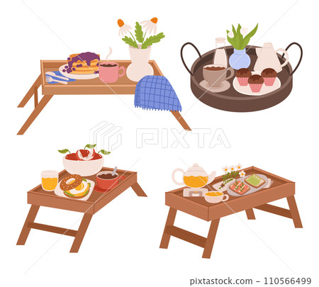 Wooden Trays or Tables With Crisp Cloths, Holds Delightful Breakfast Spread, Fresh Flowers, Warm Pastries, And Coffee 110566499
