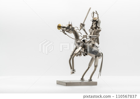Figure/metal figure of a military commander in armor riding a horse Figure/metal figure of a military commander in armor riding a horse 110567837