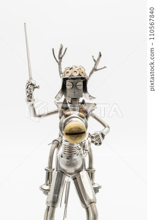 Figure/metal figure of a military commander in armor riding a horse 110567840