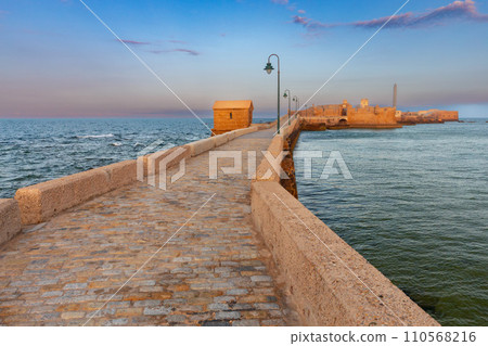 Fort Saint Sebastian and the bridge to it at dawn. Fort Saint Sebastian and the bridge to it at dawn. 110568216