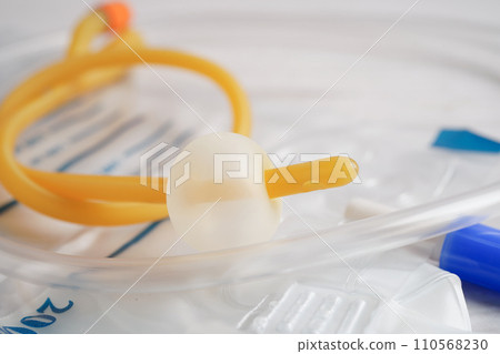 Foley catheter and urine drainage bag collect urine for disability or patient in hospital. 110568230