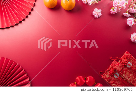 Chinese new year decorations background concept made from red packet, orange and plum blossom. 110569705