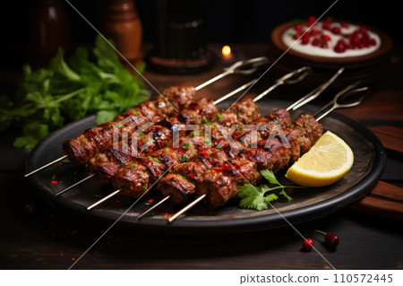 Spicy minced meat kebab usually made from lamb or beef cooked on a skewer 110572445
