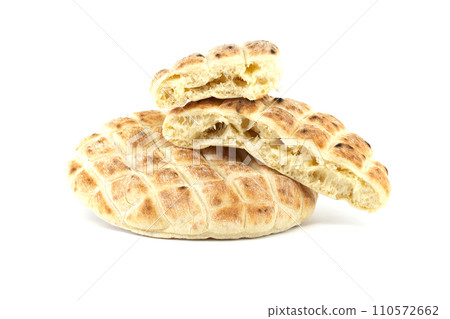 Toasted pita bread isolated on a white background 110572662