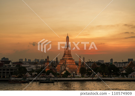 Wat Arun Temple in sunset, Temple of Dawn near Chao Phraya river. Landmark and popular for tourist attraction and Travel destination in Bangkok, Thailand and Southeast Asia concept Wat Arun Temple in sunset, Temple of Dawn near Chao Phraya river. Landmark and popular for tourist attraction and Travel destination in Bangkok, Thailand and Southeast Asia concept 110574909