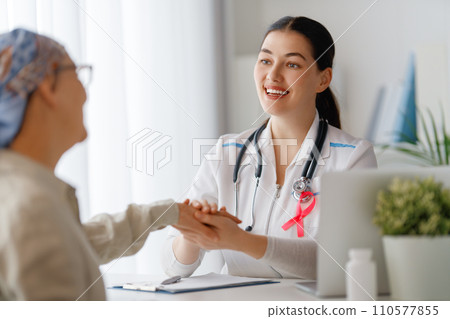 Female patient listening to doctor 110577855