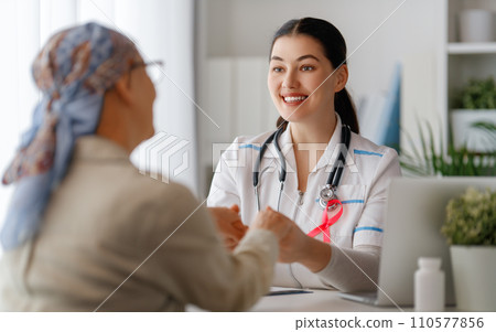 Female patient listening to doctor 110577856
