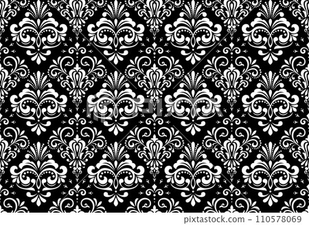 Wallpaper in the style of Baroque. Seamless vector background. White and black floral ornament. Graphic pattern for fabric, wallpaper, packaging. Ornate Damask flower ornament 110578069