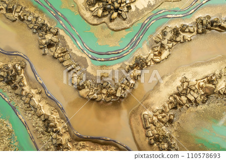 Resin art with golden colors and pieces of glass Resin art with golden colors and pieces of glass 110578693