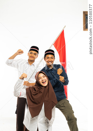 a group of islamic students standing clenched their arm 110580377