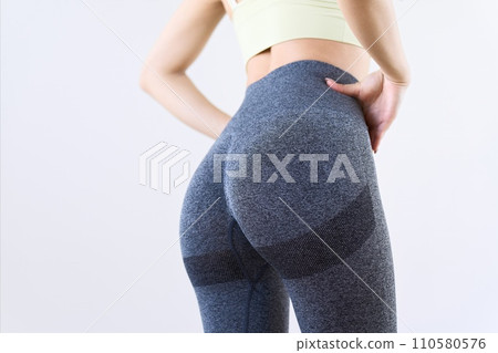 Tight female buttocks doing training 110580576