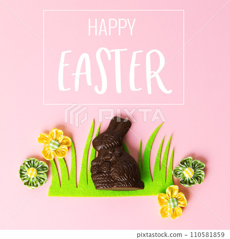 Felt Easter decorations and sweets on pink background Felt Easter decorations and sweets on pink background 110581859