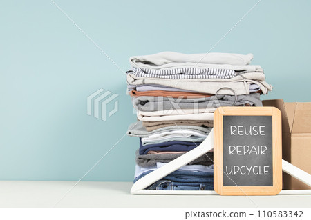 Black letter box with eco friendly motivational quote on blue background. 110583342