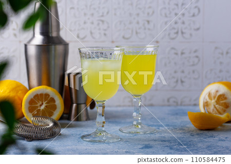Traditional italian limoncello or lemon liquor 110584475