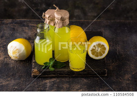 Traditional italian limoncello or lemon liquor 110584508
