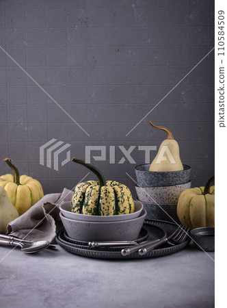 Decorative pumpkin on green background. 110584509
