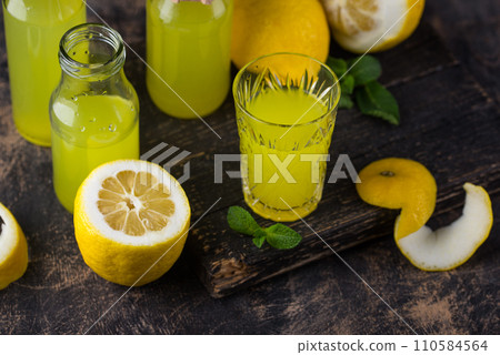 Traditional italian limoncello or lemon liquor 110584564