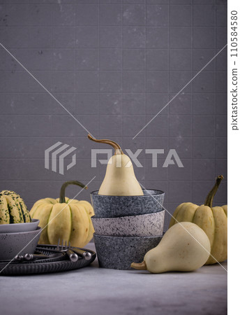 Decorative pumpkin on green background. 110584580