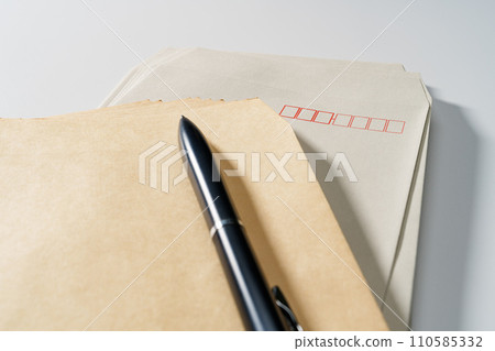 Envelopes and pen 110585332