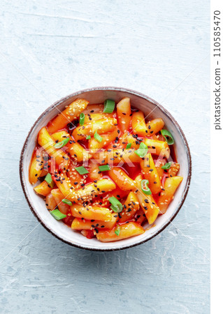 Tteokbokki or topokki, Korean street food, spicy rice cakes 110585470