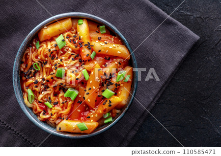 Rabokki, tteokbokki or topokki with ramen, Korean street food, spicy rice cakes Rabokki, tteokbokki or topokki with ramen, Korean street food, spicy rice cakes 110585471