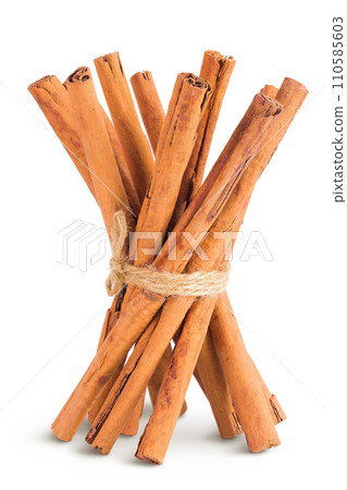 Cinnamon sticks isolated on white background with full depth of field Cinnamon sticks isolated on white background with full depth of field 110585603