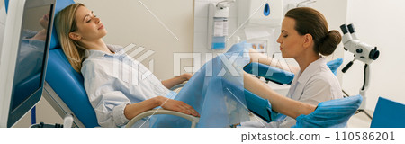 Young woman on appointment with her gynecologist during regular visit to women's consultation Young woman on appointment with her gynecologist during regular visit to women's consultation 110586201