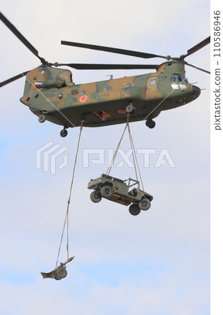 Helicopter transporting vehicles and mortars - Island recapture exercise training Helicopter transporting vehicles and mortars - Island recapture exercise training 110586946