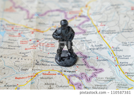 A metal toy soldier stands on the map of the Syunik region of Armenia A metal toy soldier stands on the map of the Syunik region of Armenia 110587381