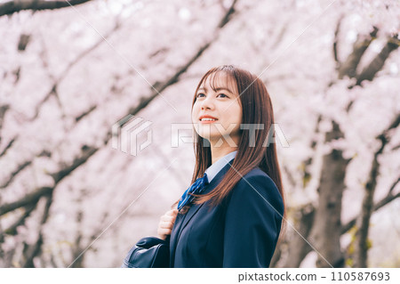 High school student (high school girl) with cherry blossom background High school student (high school girl) with cherry blossom background 110587693