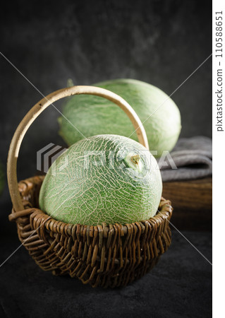 fresh melon on black background fresh melon on black background 110588651