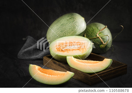 fresh melon on black background 110588678