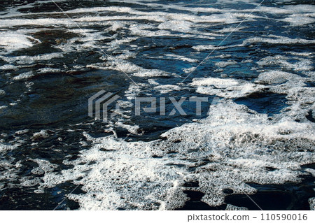 Foaming substances on surface of river Foaming substances on surface of river 110590016