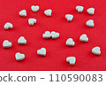 white hearts on a red background as a type of Valentine's Day card 110590083
