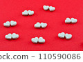 white hearts on a red background as a type of Valentine's Day card 110590086