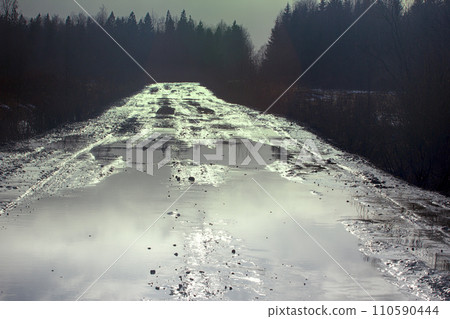 Winter dirt way glitters in ambient light Winter dirt way glitters in ambient light 110590444
