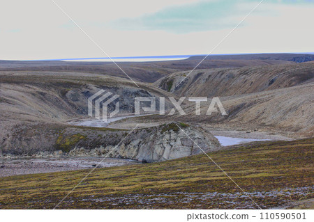 Scarce landscape of cold Arctic desert. Novaya Zemlya archipelago. Nuclear testing range 2 110590501