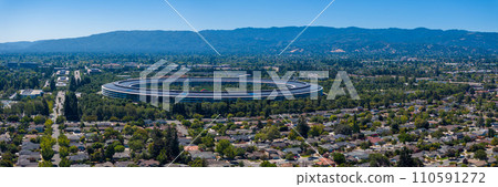Aerial view of the main Apple office building - a space ship in California, USA. Aerial view of the main Apple office building - a space ship in California, USA. 110591272